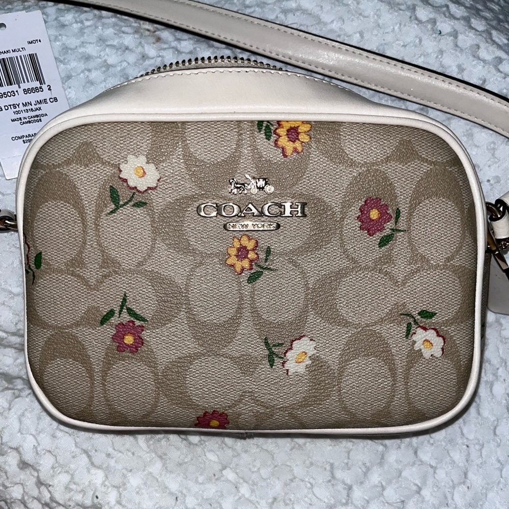 Cute floral coach purse I just don’t use anymore!